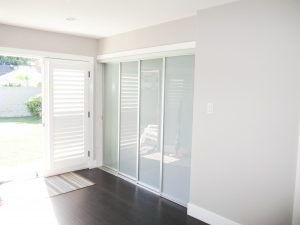 2-track, 4-panel, bypass Closet Door System with laminated glass doors