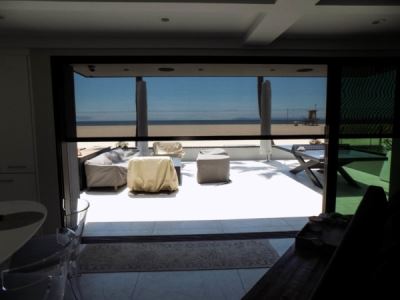 Beach House Motorized Power Screen in Newport Beach