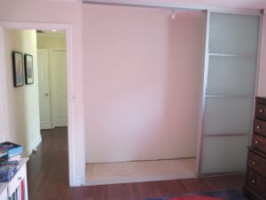 3-panel, 3-track, silver-framed Closet Doors with white laminated glass