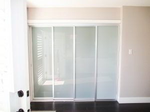 2-track, 4-panel, bypass Closet Door System with laminated glass doors