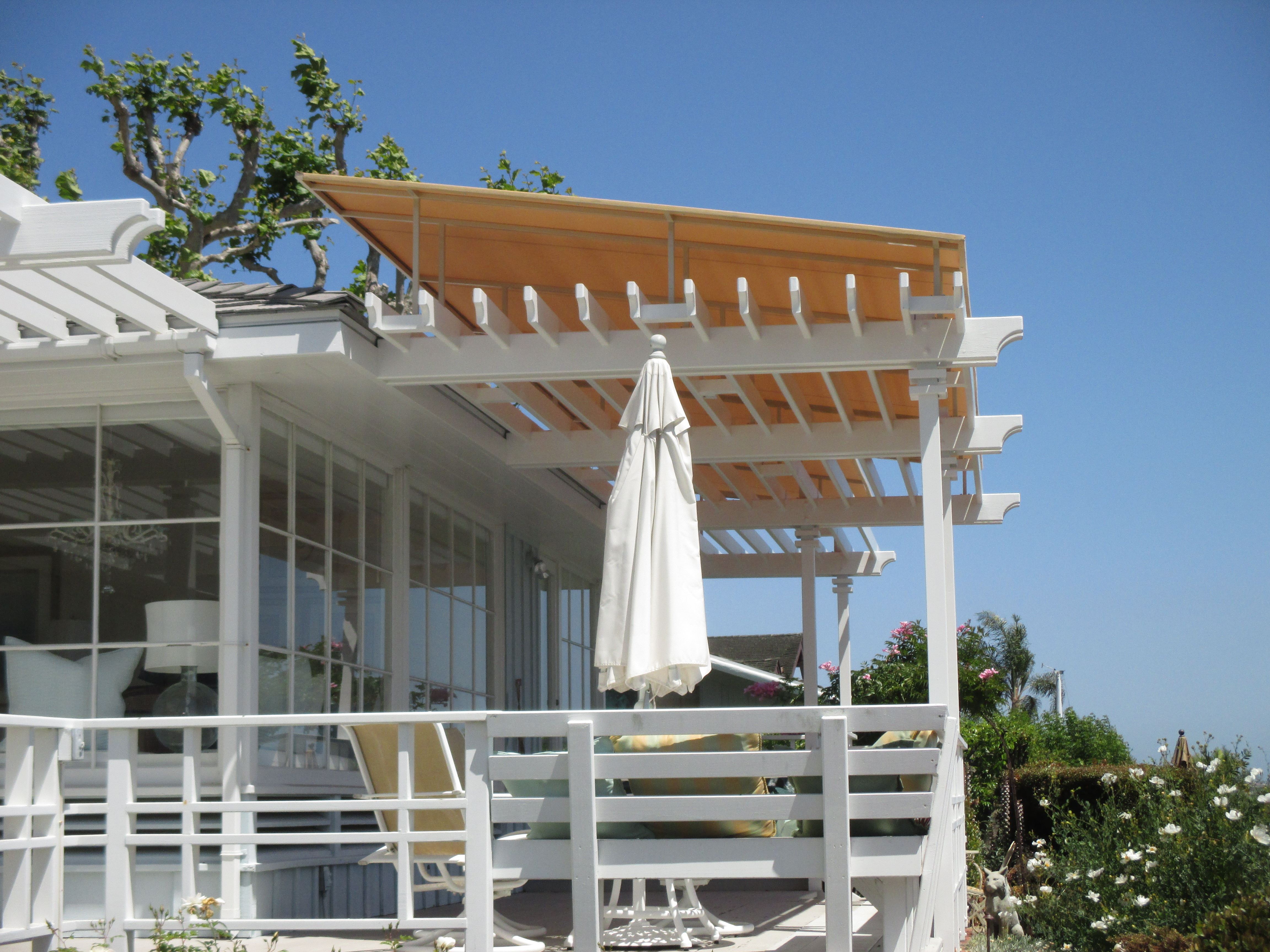 Sloped Trellis Awning Cover for sun protection on a wood patio trellis