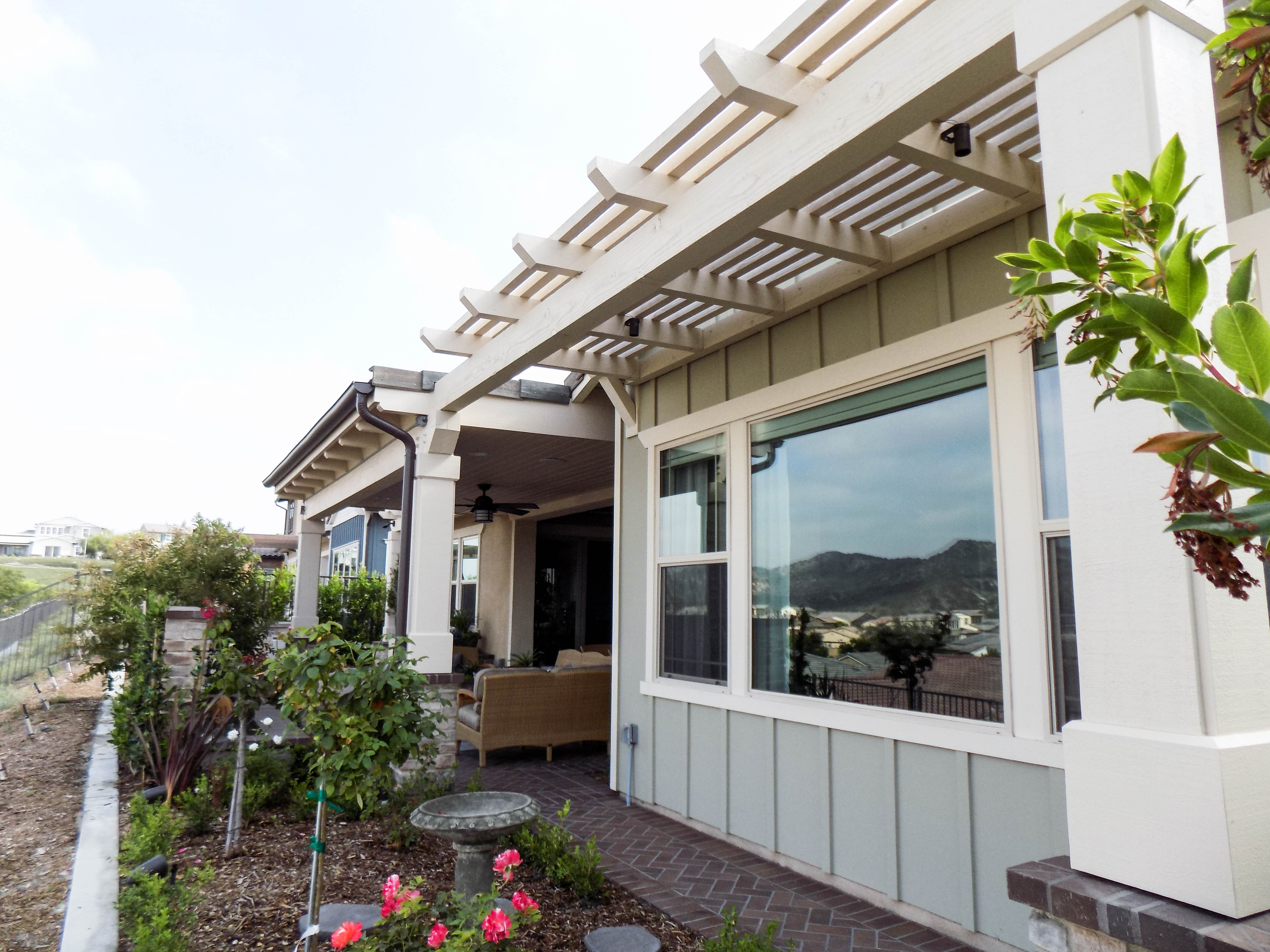 Retractable Awning with a Drop Valence and two Motorized Power Screens