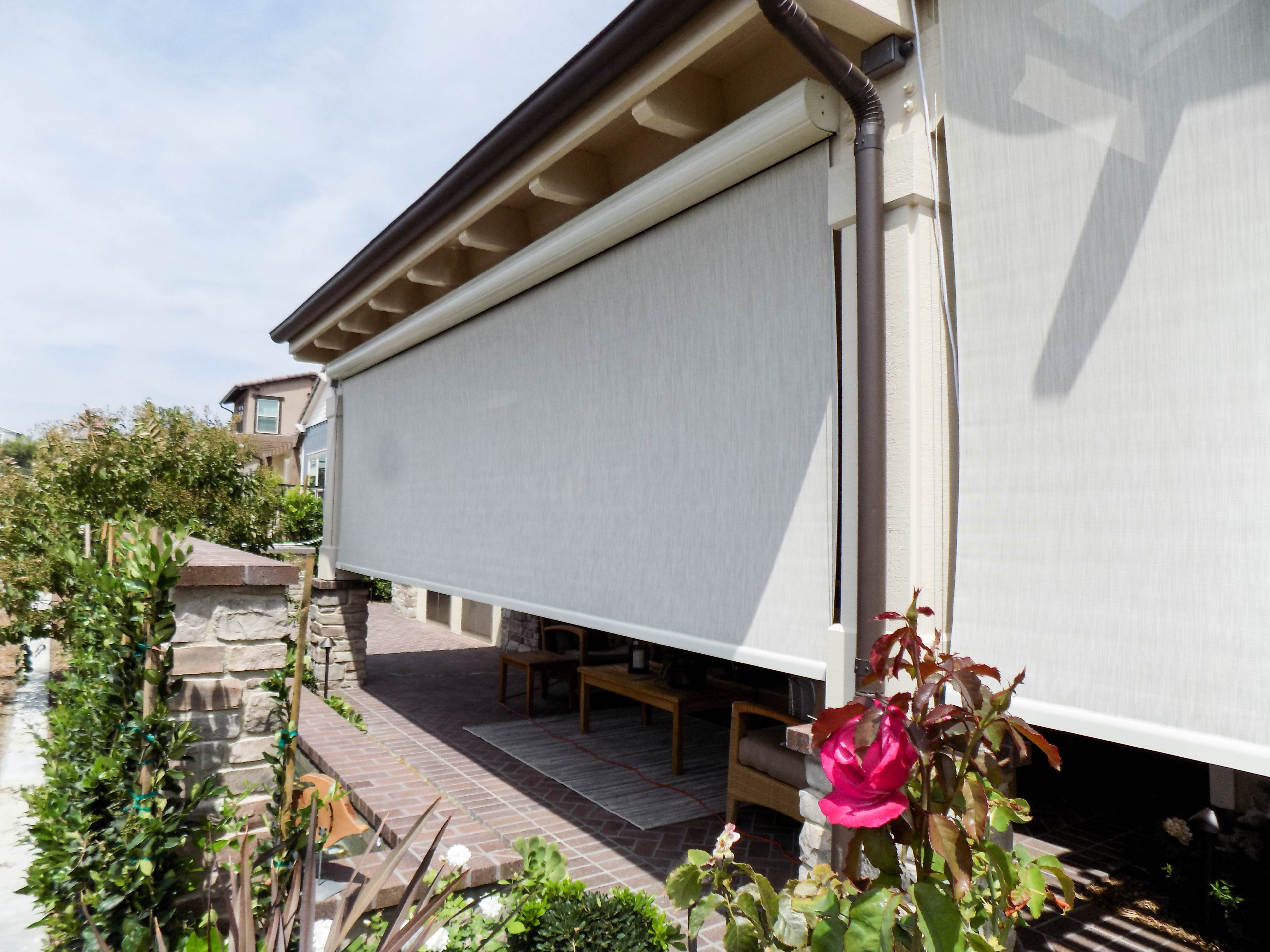 Retractable Awning with a Drop Valence and two Motorized Power Screens