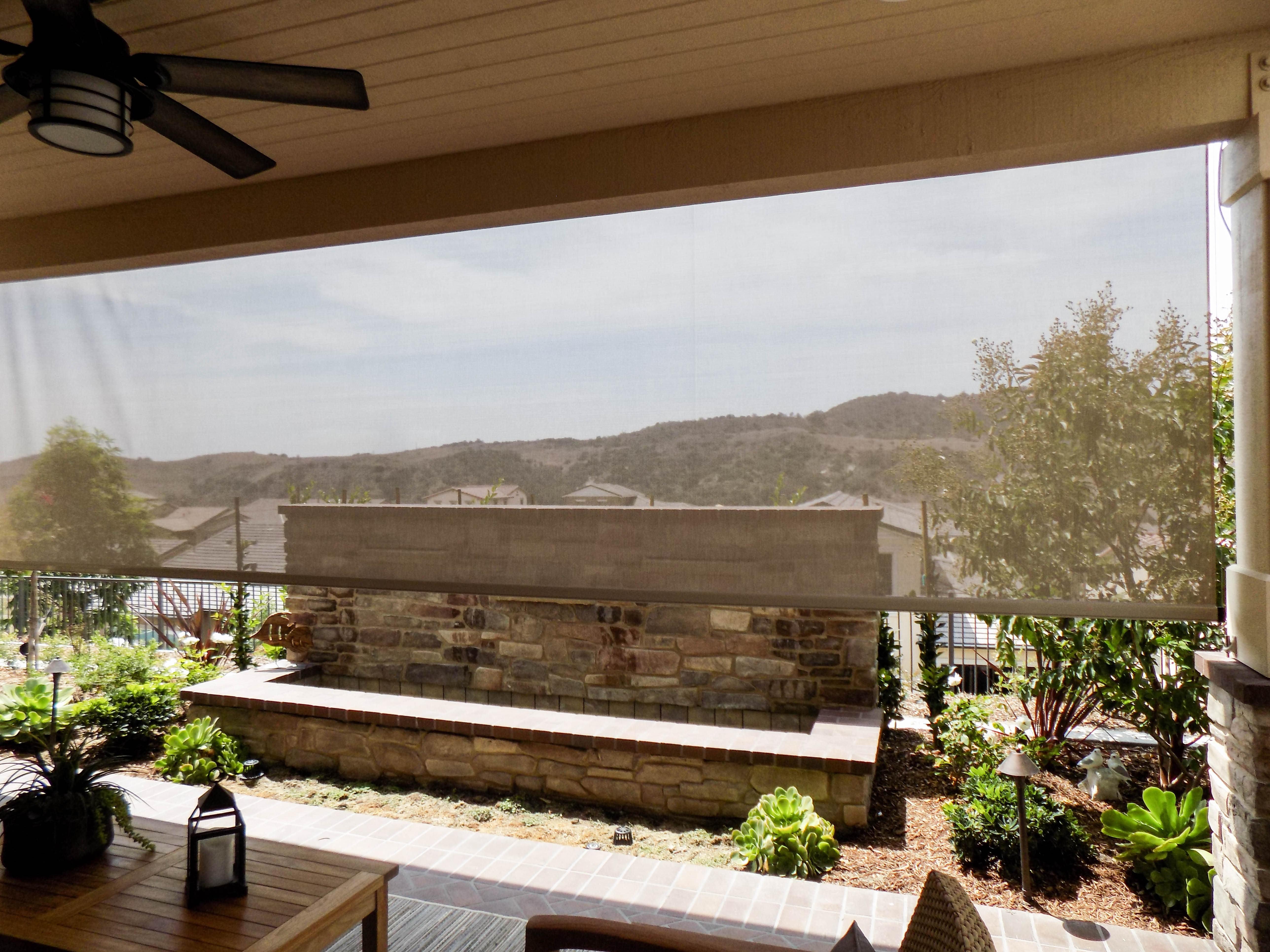 Retractable Awning with a Drop Valence and two Motorized Power Screens