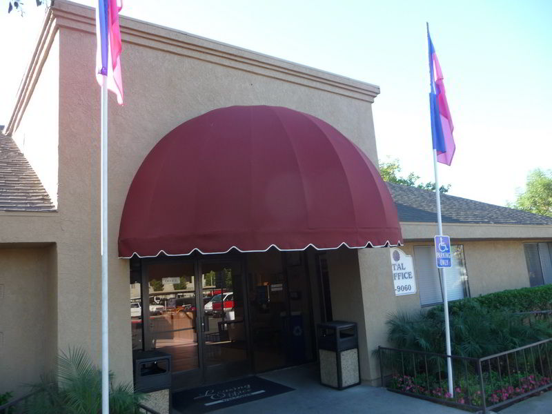 rental office with burgundy awning